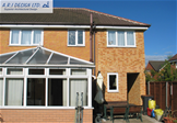 Two storey side extension with access to rear (rear external)